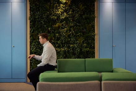 Man sat down in the SmartSearch office area
