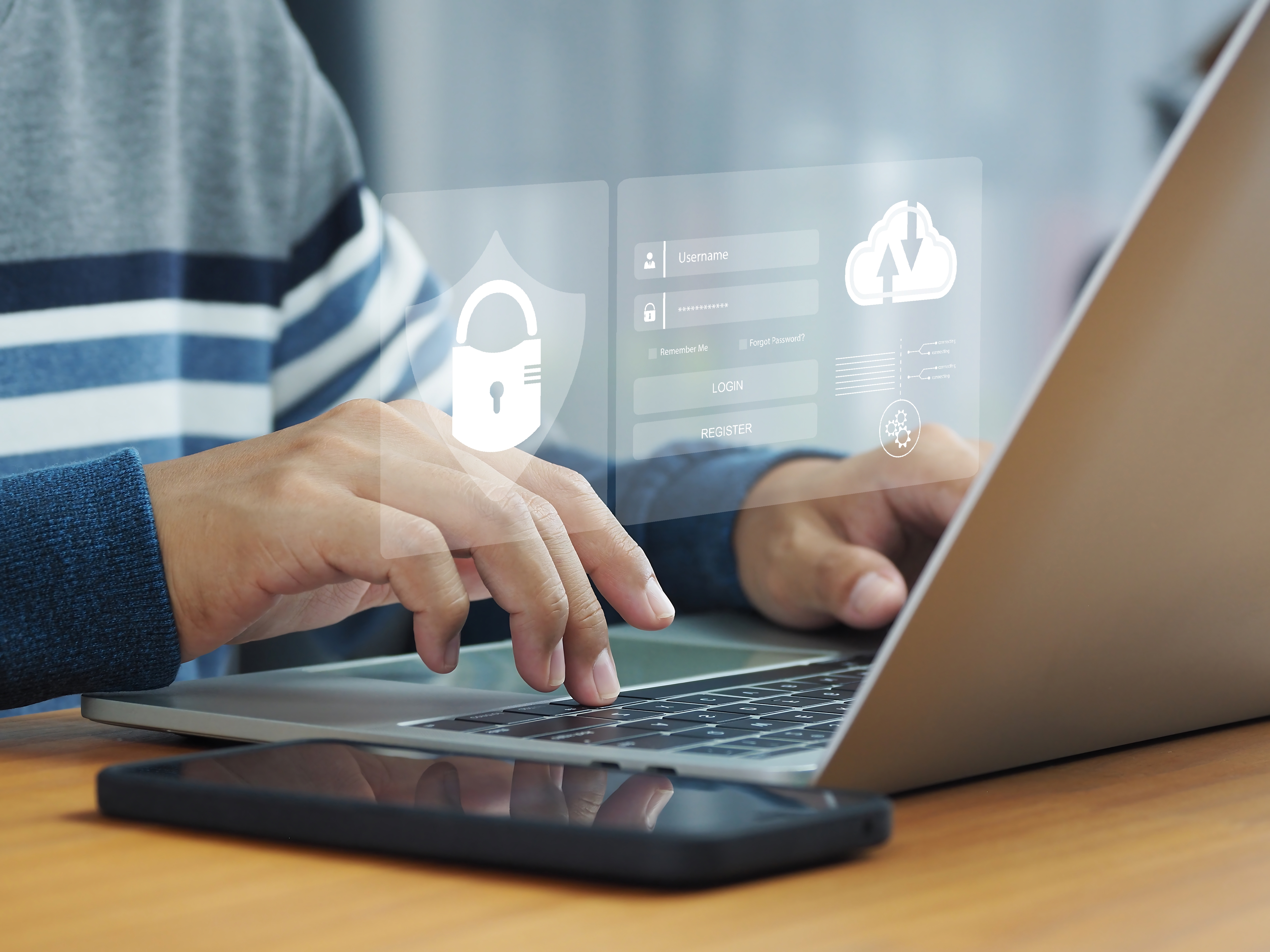 Person in front of a computer using transaction monitoring software